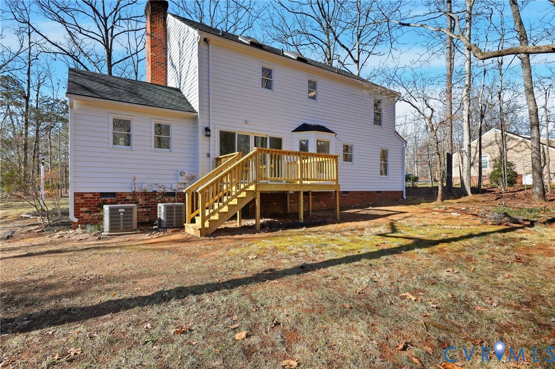 3264 Sherwood Ridge Way Powhatan, VA 23139 - Photo 37 of 40 a front view of a house with a yard