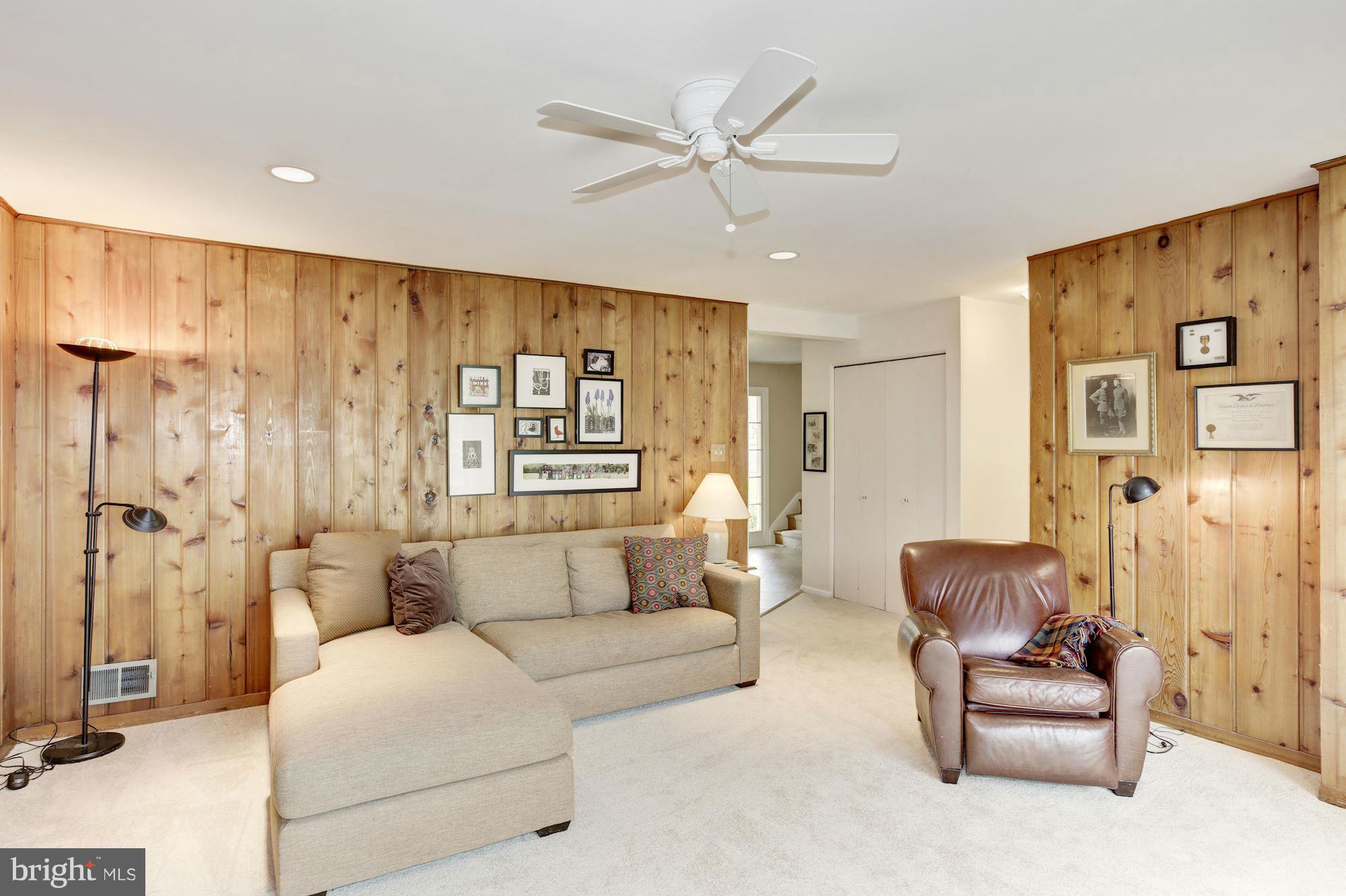 6007 Roxbury Avenue Springfield, VA 22152 - Photo 16 of 30 Family Room with carpet and knotty pine