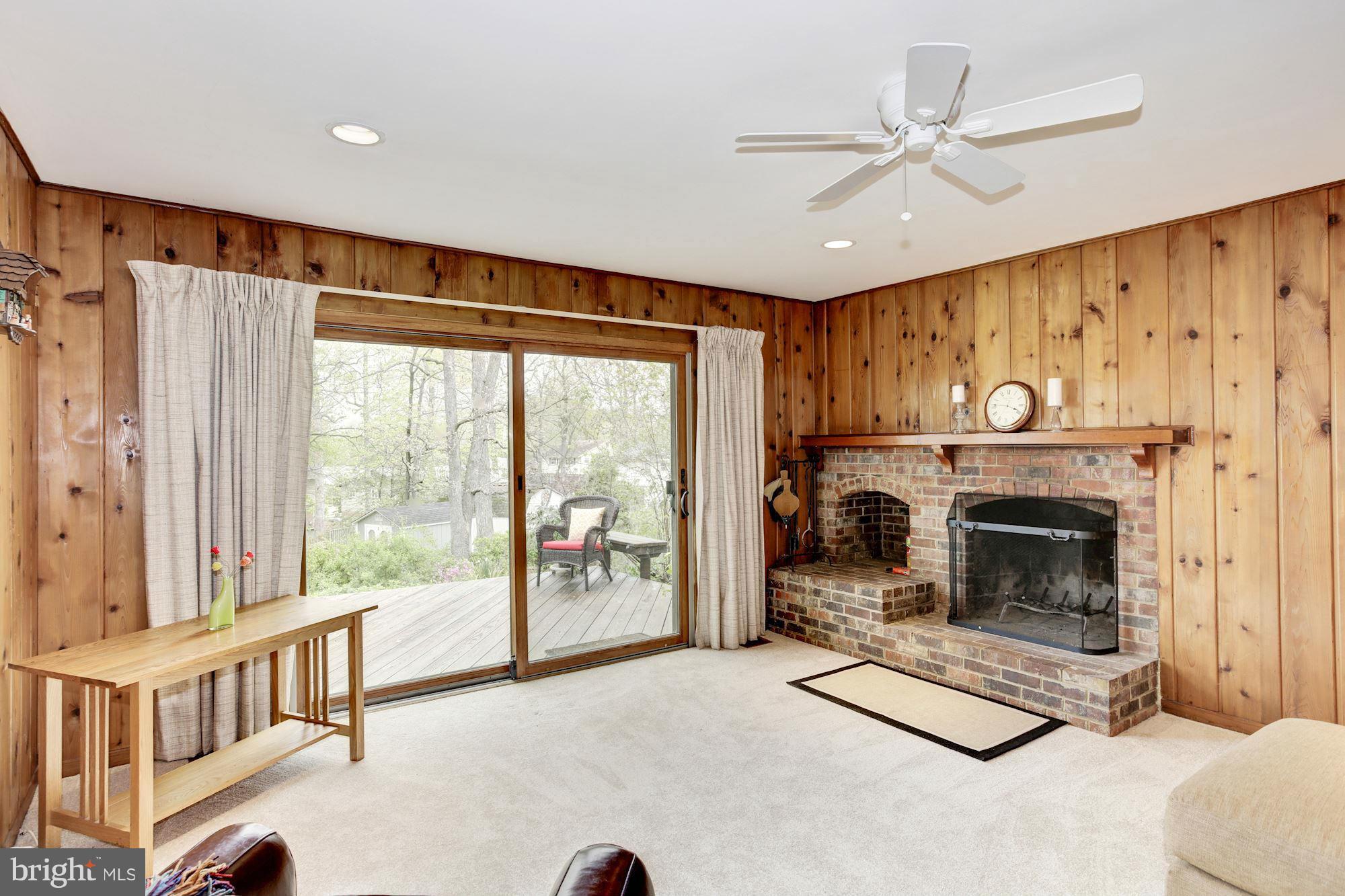 6007 Roxbury Avenue Springfield, VA 22152 - Photo 17 of 30 Wood-burning fireplace, slider to large deck