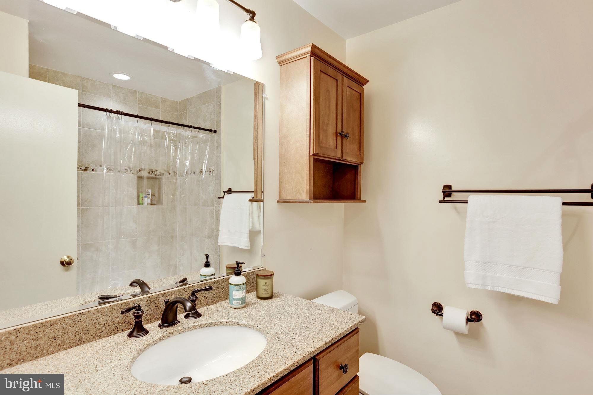 6007 Roxbury Avenue Springfield, VA 22152 - Photo 24 of 30 Hall bath has been upgraded with custom tile