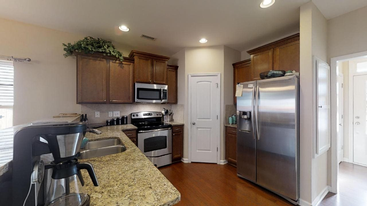 Engineered hardwood floors for slab construction! Kitchen
