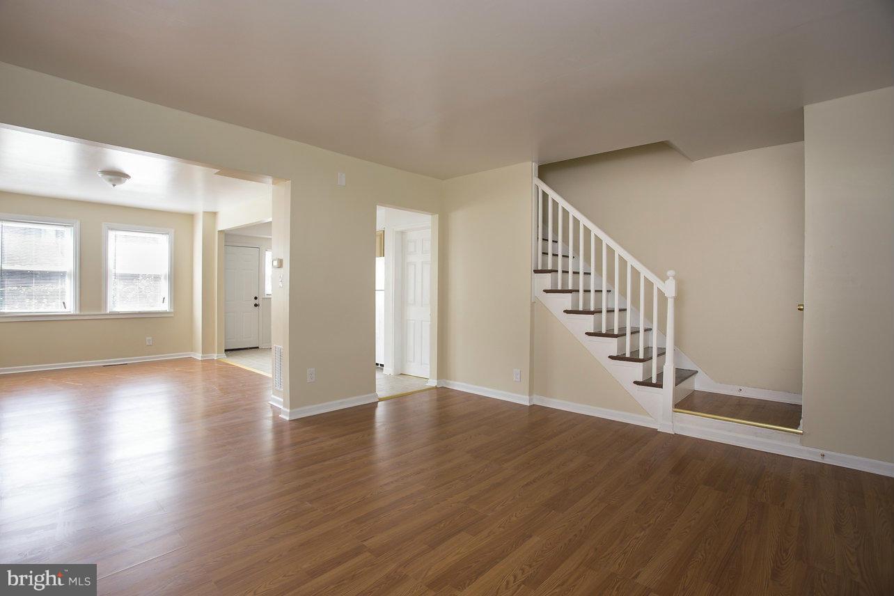 4658 Marble Hall Road Baltimore, MD 21239 - Photo 2 of 23 a view of an entryway with wooden floor