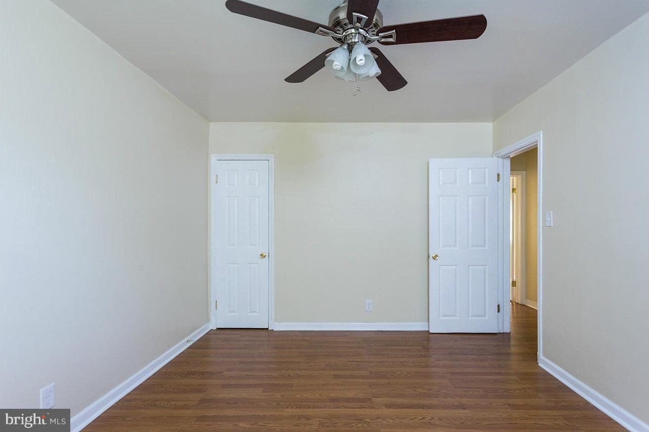 4658 Marble Hall Road Baltimore, MD 21239 - Photo 21 of 23 a view of a room with wooden floor