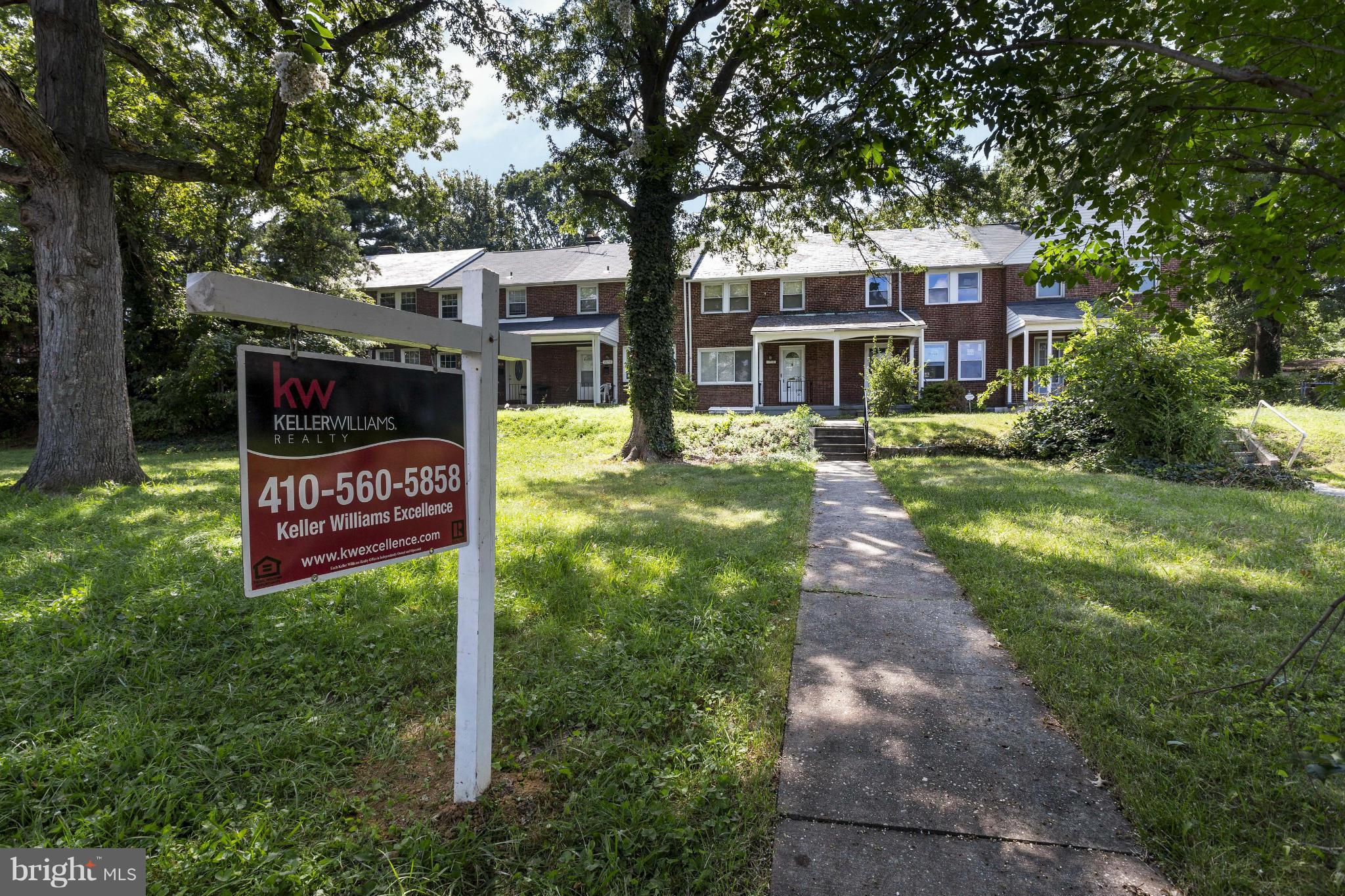4658 Marble Hall Road Baltimore, MD 21239 - Photo 4 of 23 a sign board with yard in front of it