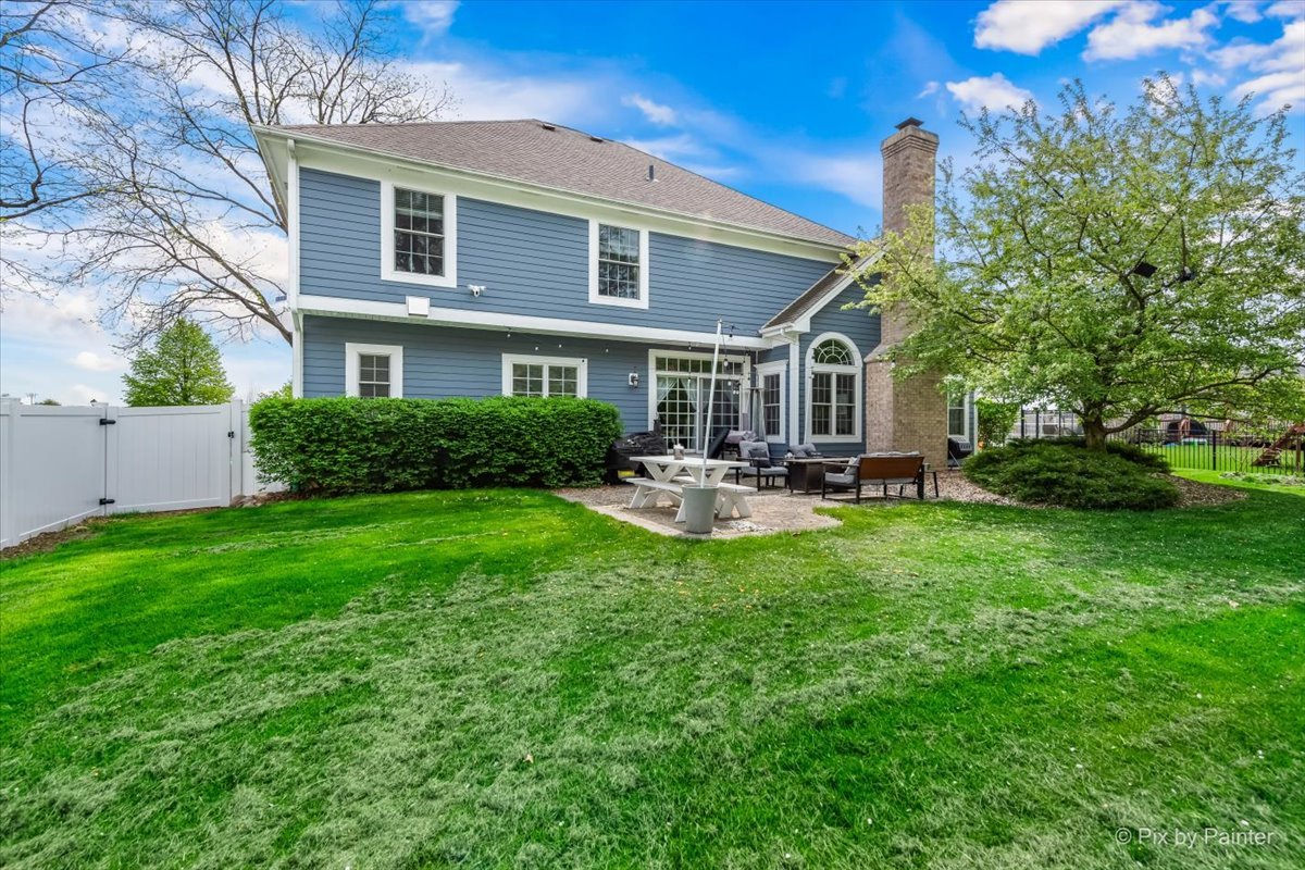 5 Walnut Ridge Court Cary, IL 60013 - Photo 2 of 2 a large tree in front of a house