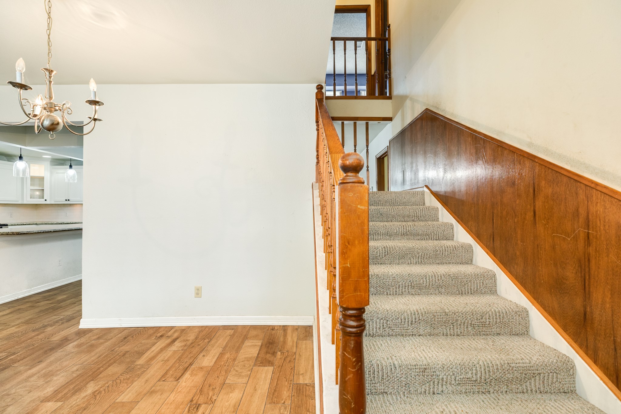 52 South Bachelor Button Street Lake Jackson, TX 77566 - Photo 20 of 45 a view of staircase with white walls and railing