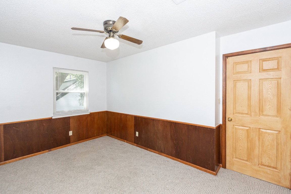 52 South Bachelor Button Street Lake Jackson, TX 77566 - Photo 28 of 45 a view of an empty room with a window
