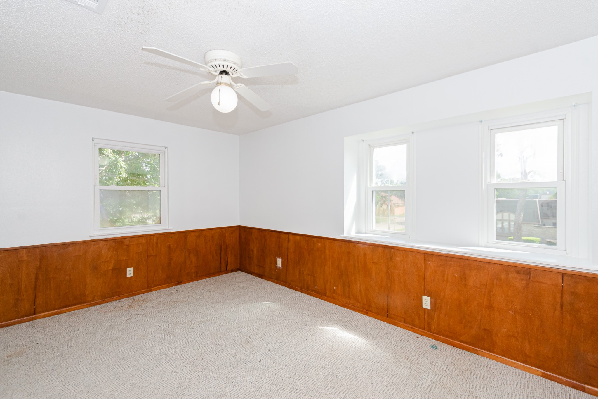 52 South Bachelor Button Street Lake Jackson, TX 77566 - Photo 29 of 45 a view of an empty room with a window