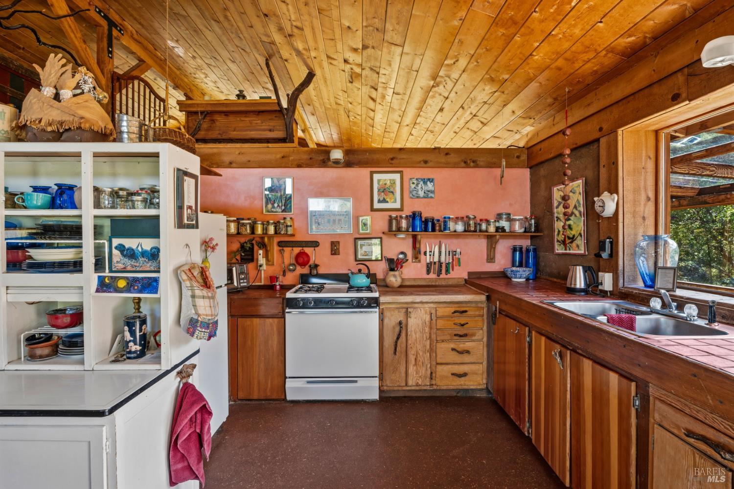 3751 Low Gap Road Ukiah, CA 95482 - Photo 3 of 22 a kitchen with stainless steel appliances granite countertop a stove and cabinets