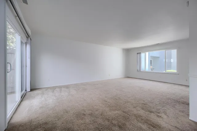 a kitchen with a sink stove and microwave