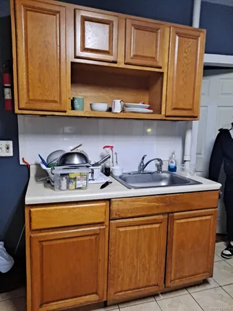 a view of cabinets and wooden floor