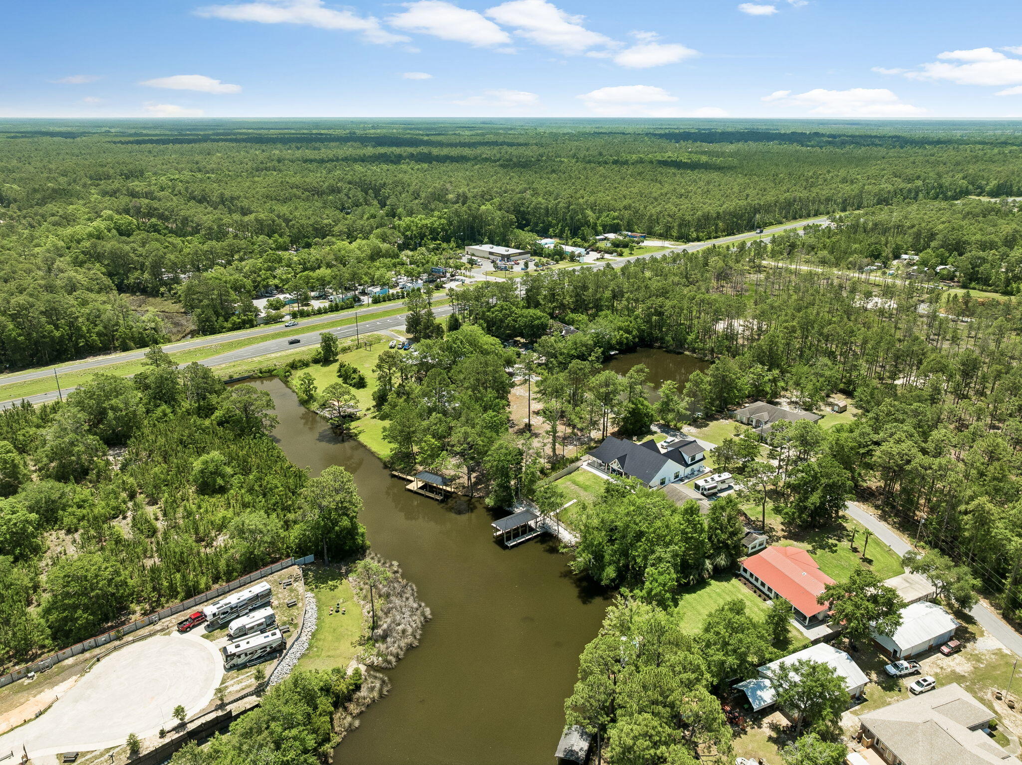 92 Waterside Lane Freeport, FL 32439 - Photo 9 of 28 an aerial view of residential houses with outdoor space and lake view