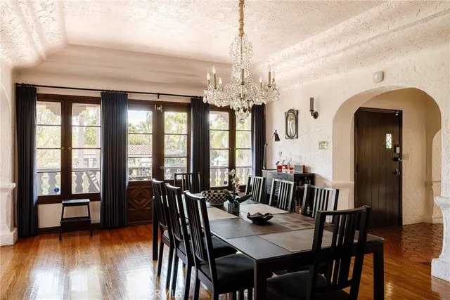 a view of a dining room with furniture and window