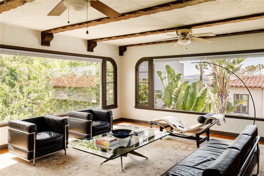 7 South 37th Place Long Beach, CA 90803 - Photo 26 of 52 a living room with furniture and floor to ceiling windows