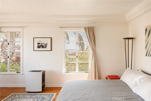 a view of a balcony with wooden floor