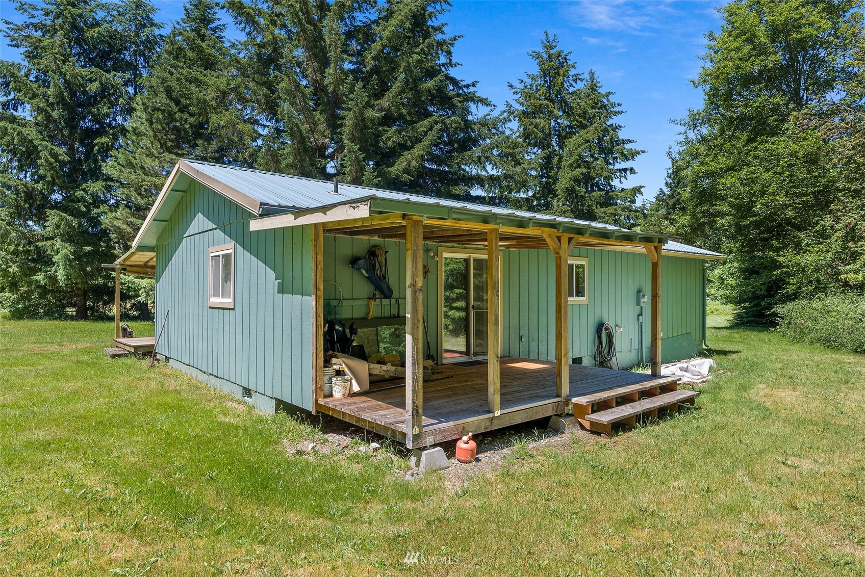 2158 Cispus Road Randle, WA 98377 - Photo 23 of 36 a view of a small house with yard