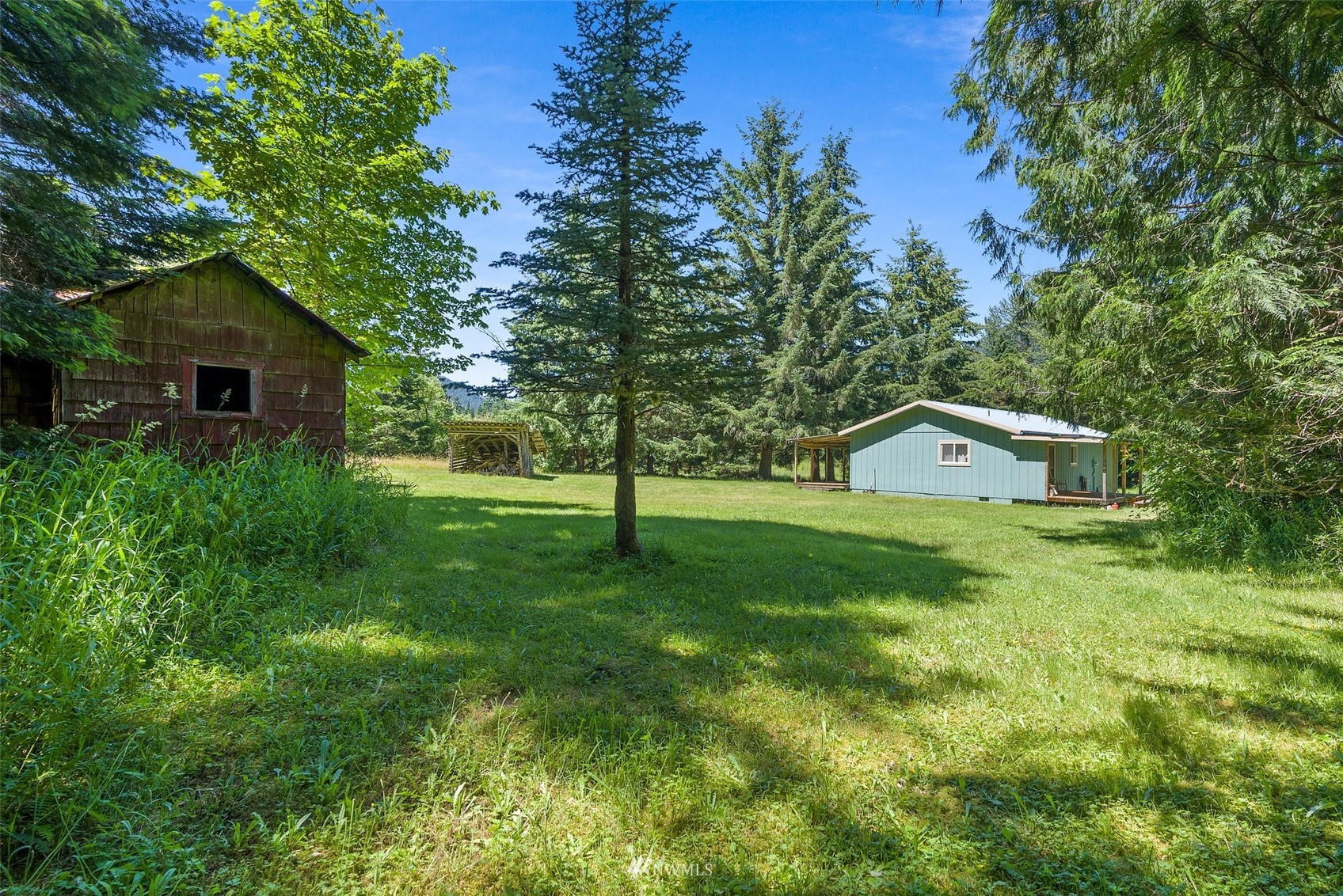 2158 Cispus Road Randle, WA 98377 - Photo 25 of 36 a front view of a house with garden
