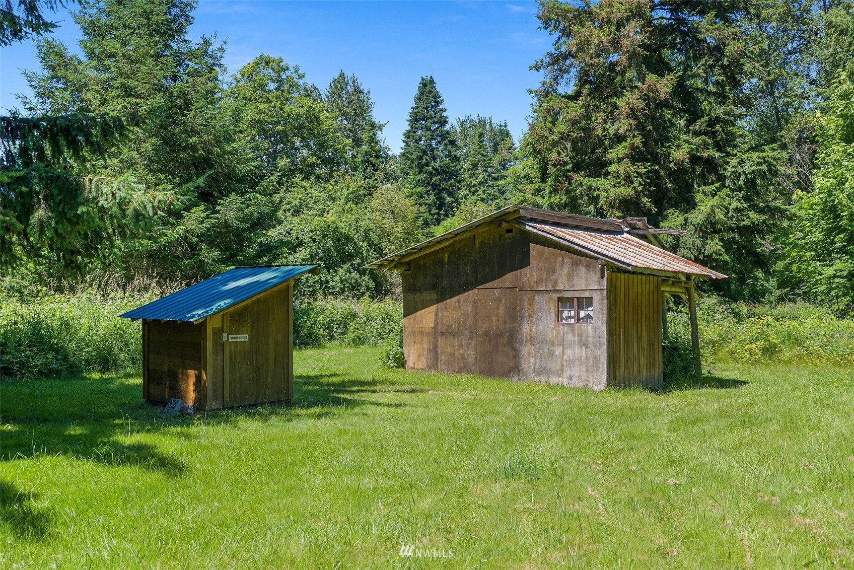 2158 Cispus Road Randle, WA 98377 - Photo 26 of 36 a view of a barn in the middle of a yard