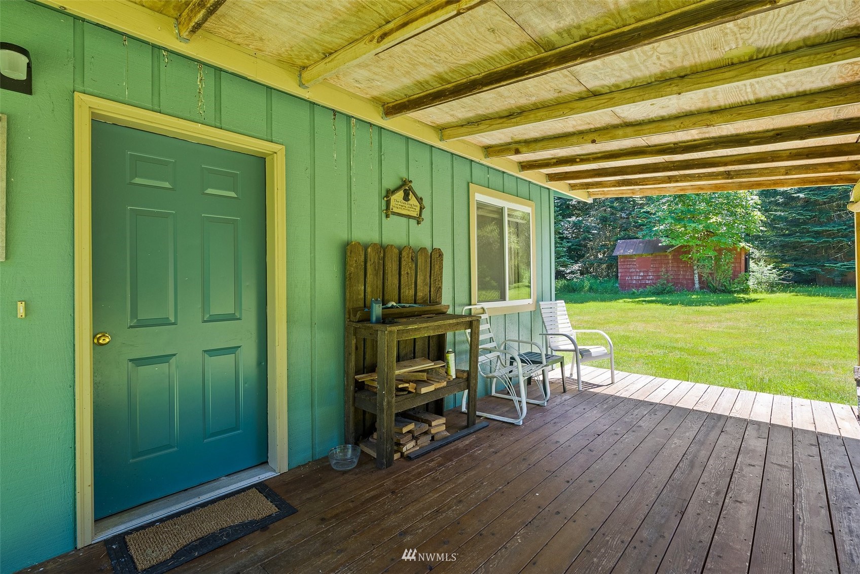 2158 Cispus Road Randle, WA 98377 - Photo 6 of 36 a view of a room with wooden floor and outdoor seating