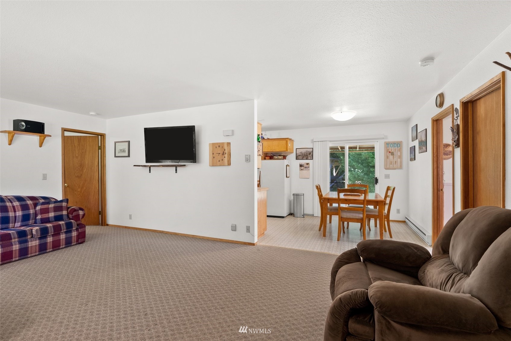 2158 Cispus Road Randle, WA 98377 - Photo 7 of 36 a living room with furniture and a flat screen tv