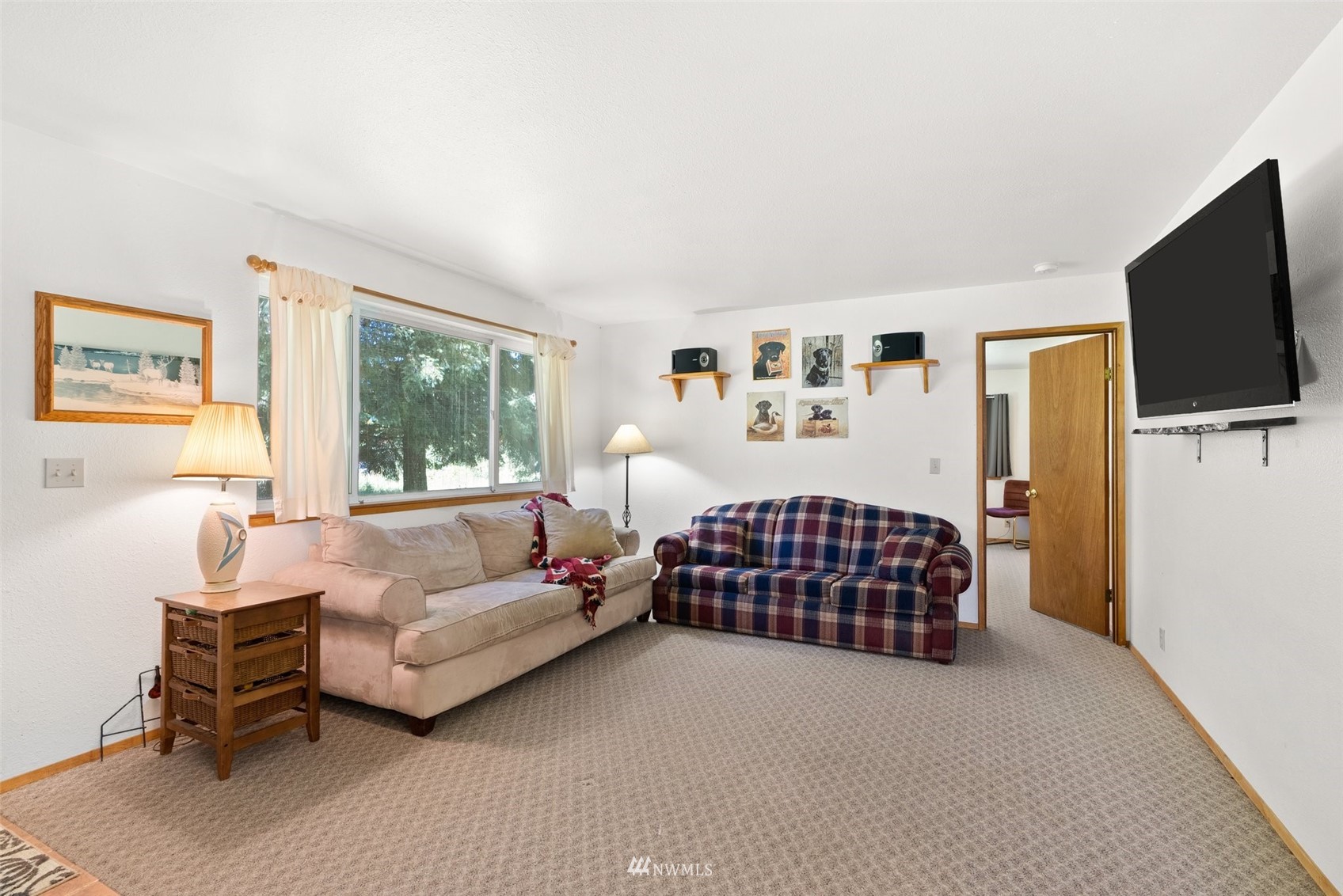 2158 Cispus Road Randle, WA 98377 - Photo 8 of 36 a bedroom with furniture and a flat screen tv