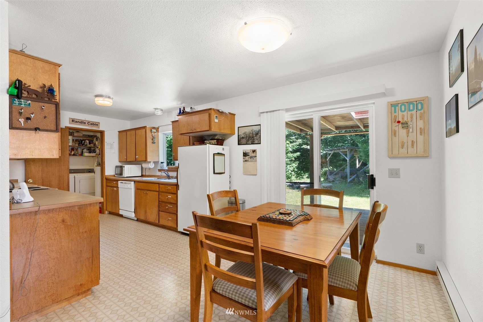 2158 Cispus Road Randle, WA 98377 - Photo 10 of 36 a view of a dining room with furniture window and outside view