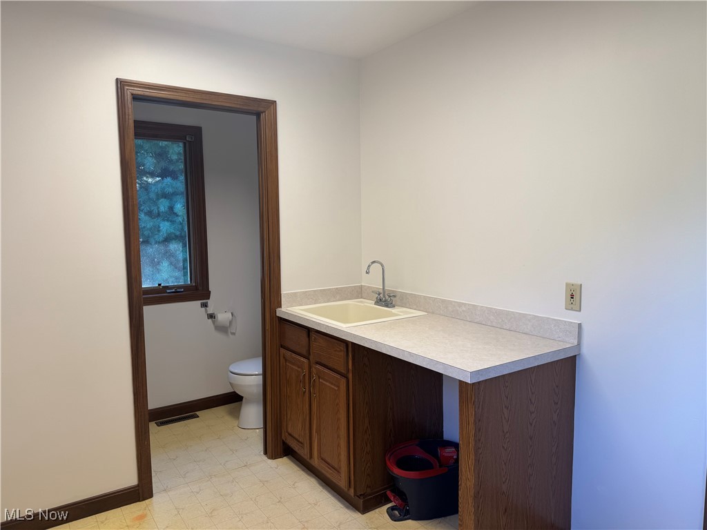 6442 Peck Road Ravenna, OH 44266 - Photo 19 of 24 Laundry room off garage with half bath