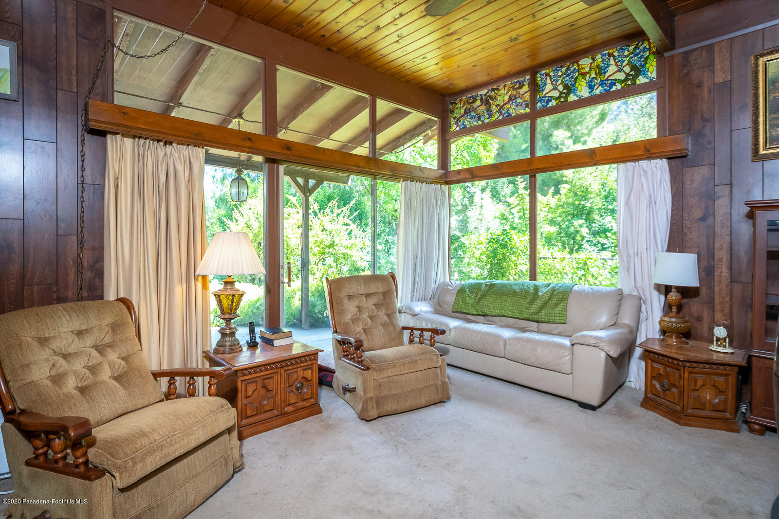 2311 Stonyvale Road Tujunga, CA 91042 - Photo 17 of 83 a living room with furniture and a large window