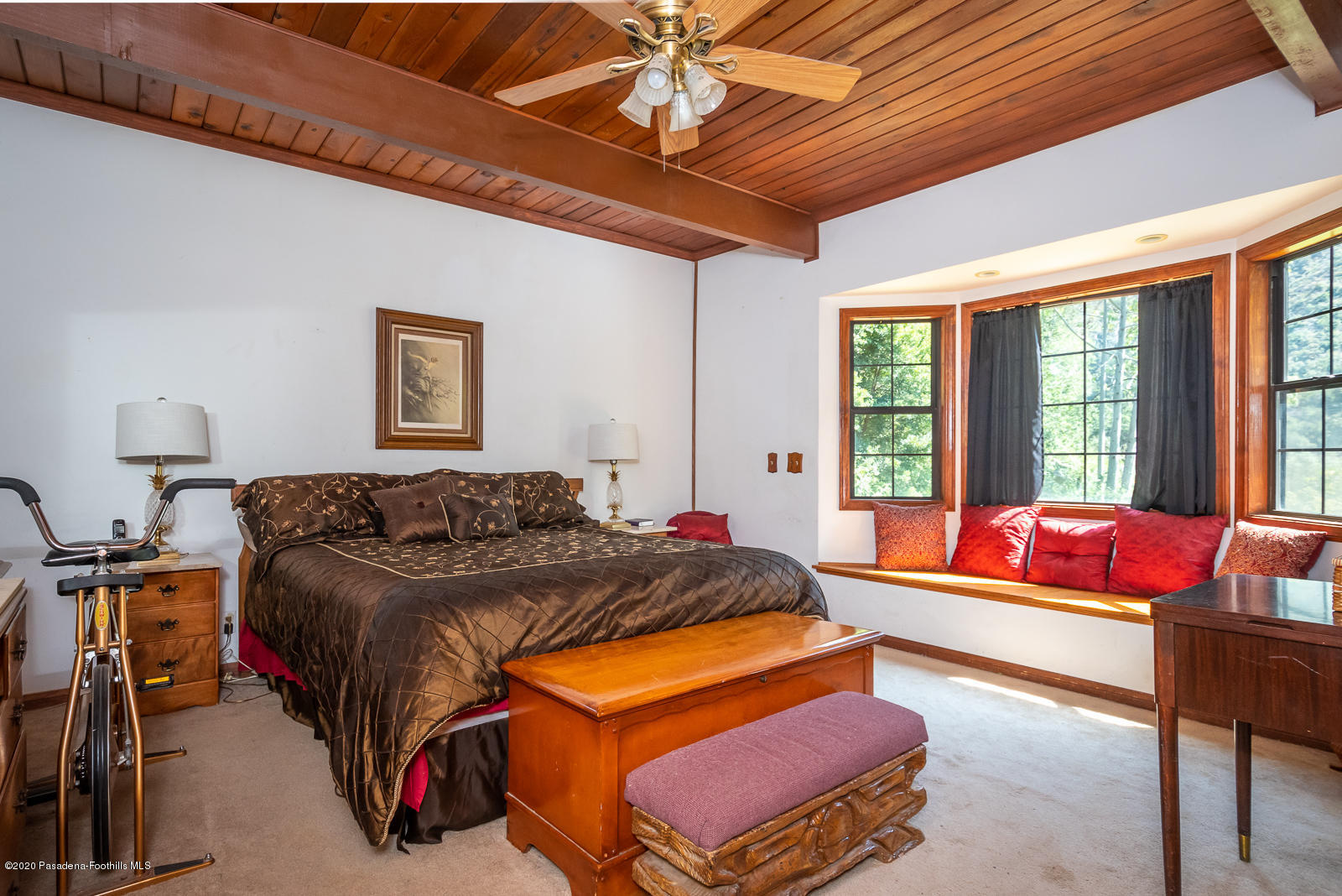 2311 Stonyvale Road Tujunga, CA 91042 - Photo 22 of 83 a bedroom with furniture and a large window