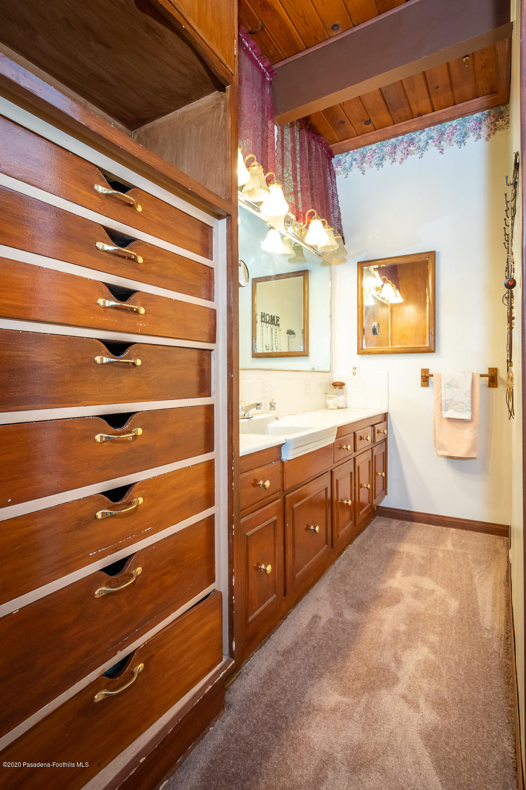 2311 Stonyvale Road Tujunga, CA 91042 - Photo 24 of 83 a spacious bathroom with a double vanity sink a toilet and a shower