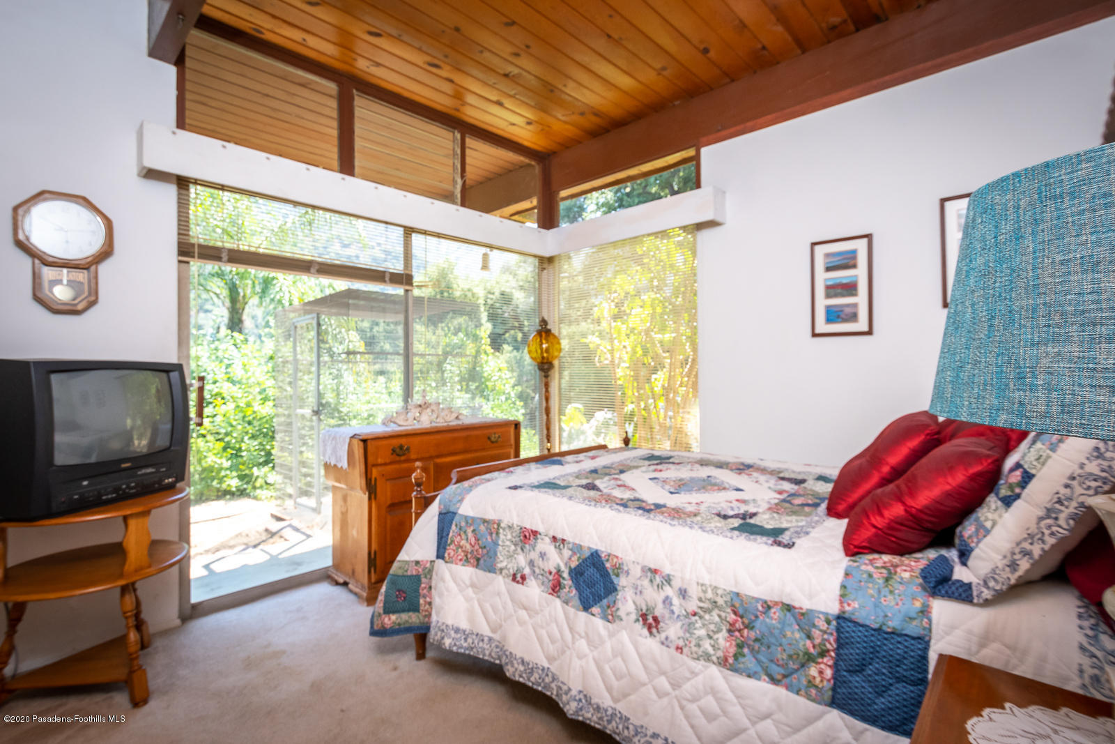 2311 Stonyvale Road Tujunga, CA 91042 - Photo 30 of 83 a bedroom with a bed and wooden floor