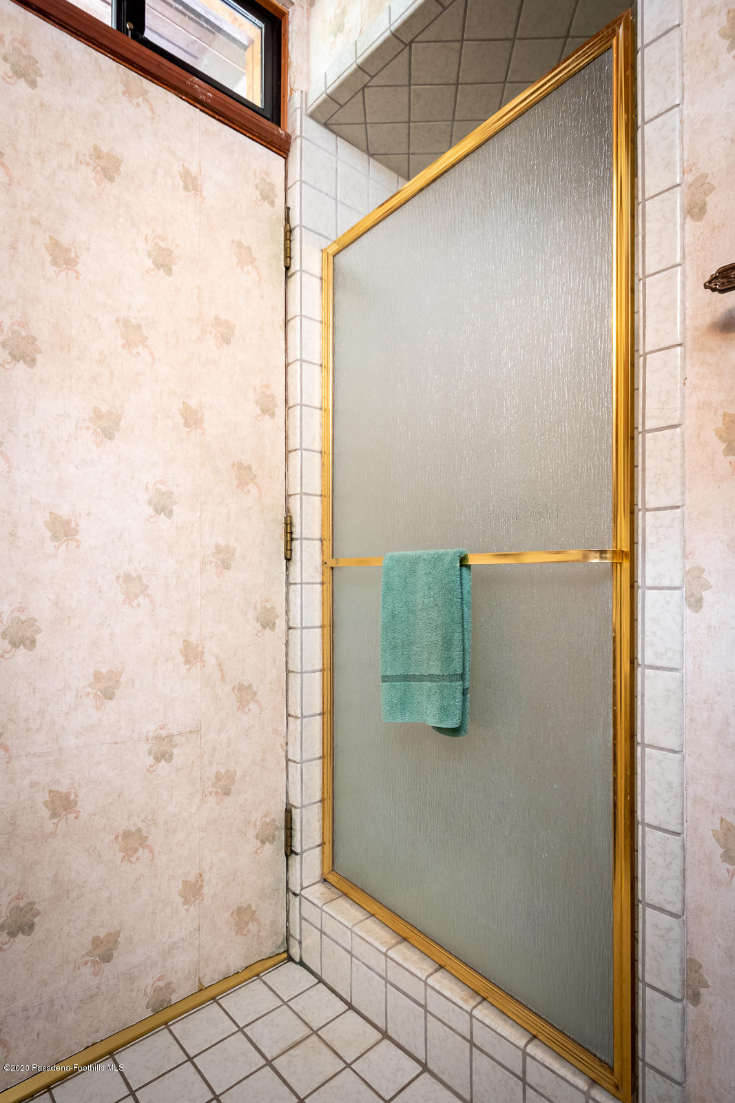 2311 Stonyvale Road Tujunga, CA 91042 - Photo 37 of 83 a bathroom with a shower and a sink