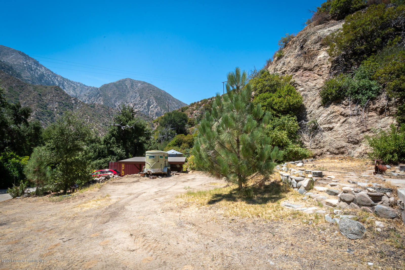 2311 Stonyvale Road Tujunga, CA 91042 - Photo 41 of 83 a view of a bench in the middle of a field