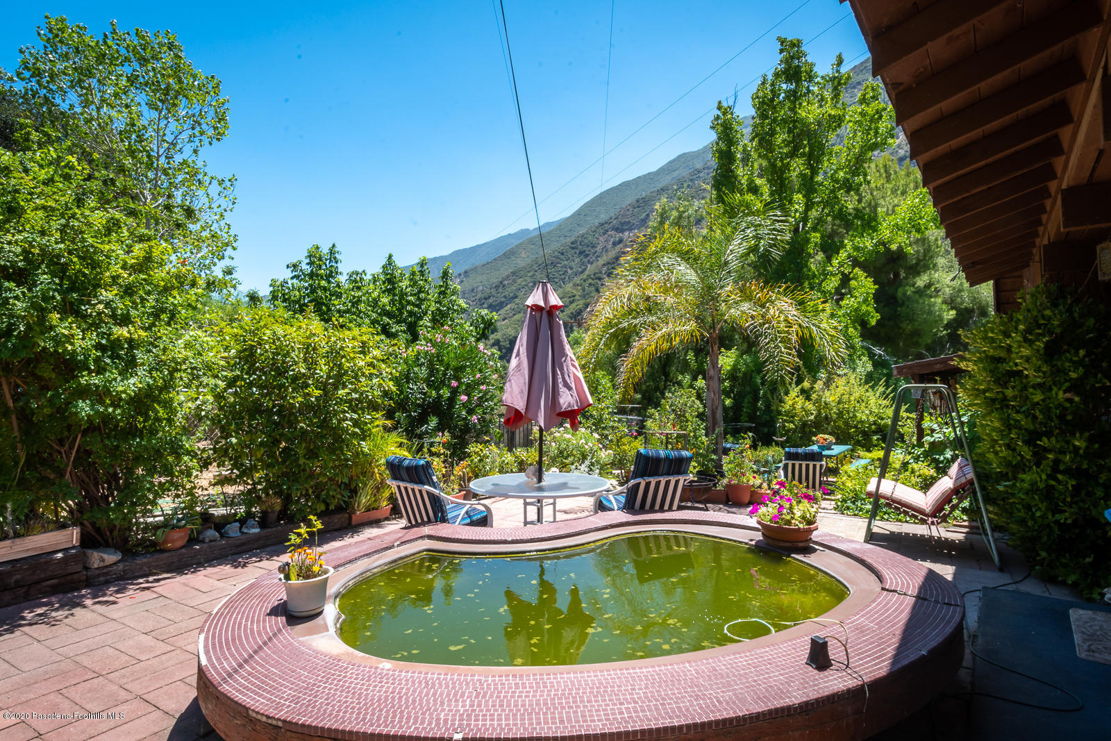 2311 Stonyvale Road Tujunga, CA 91042 - Photo 48 of 83 a view of a swimming pool with a yard