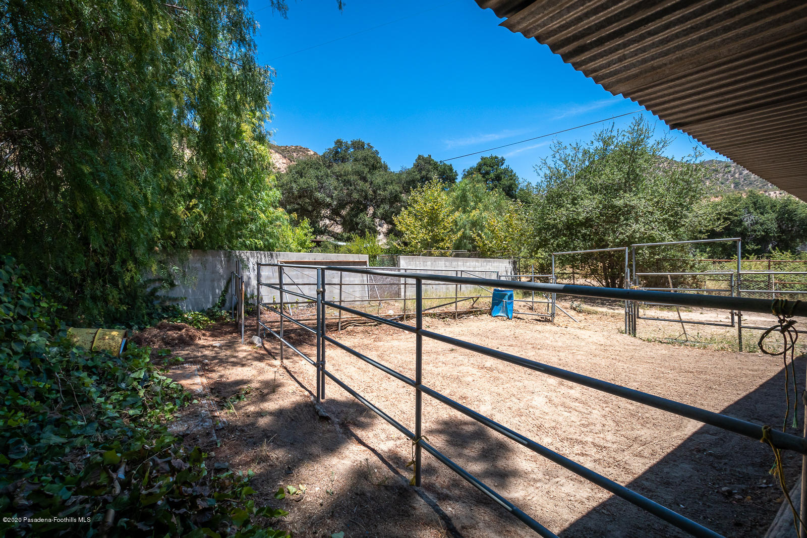2311 Stonyvale Road Tujunga, CA 91042 - Photo 58 of 83 a view of a balcony with wooden floor and outdoor seating