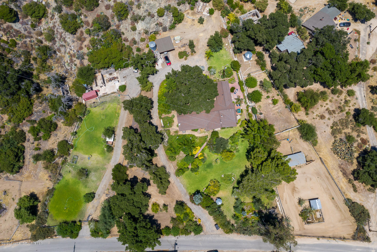 2311 Stonyvale Road Tujunga, CA 91042 - Photo 76 of 83 an aerial view of a house with a yard and garden