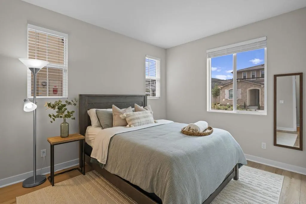 3015 Rue De Latour Vista, CA 92084 - Photo 19 of 48 a bedroom with a bed and window