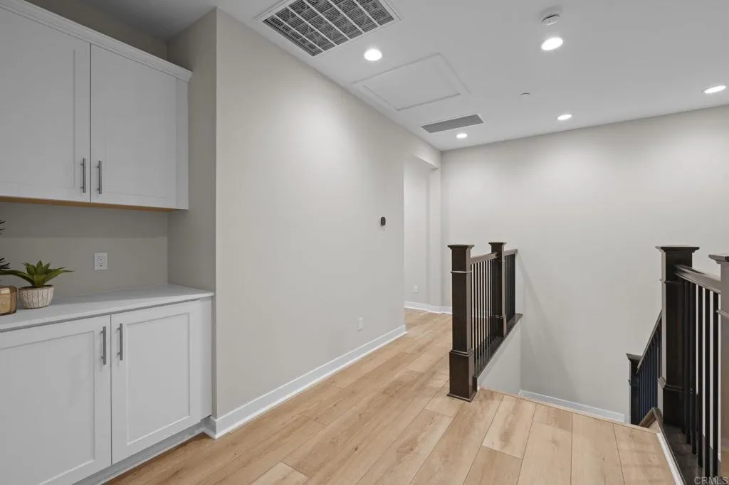 3015 Rue De Latour Vista, CA 92084 - Photo 21 of 48 a view of a hallway with closet