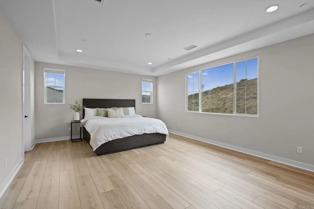 3015 Rue De Latour Vista, CA 92084 - Photo 23 of 48 a bedroom with a bed and a window