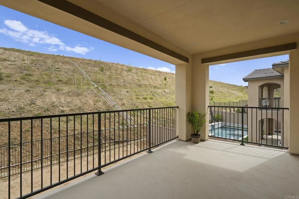3015 Rue De Latour Vista, CA 92084 - Photo 27 of 48 a view of balcony with floor to ceiling window and stairs
