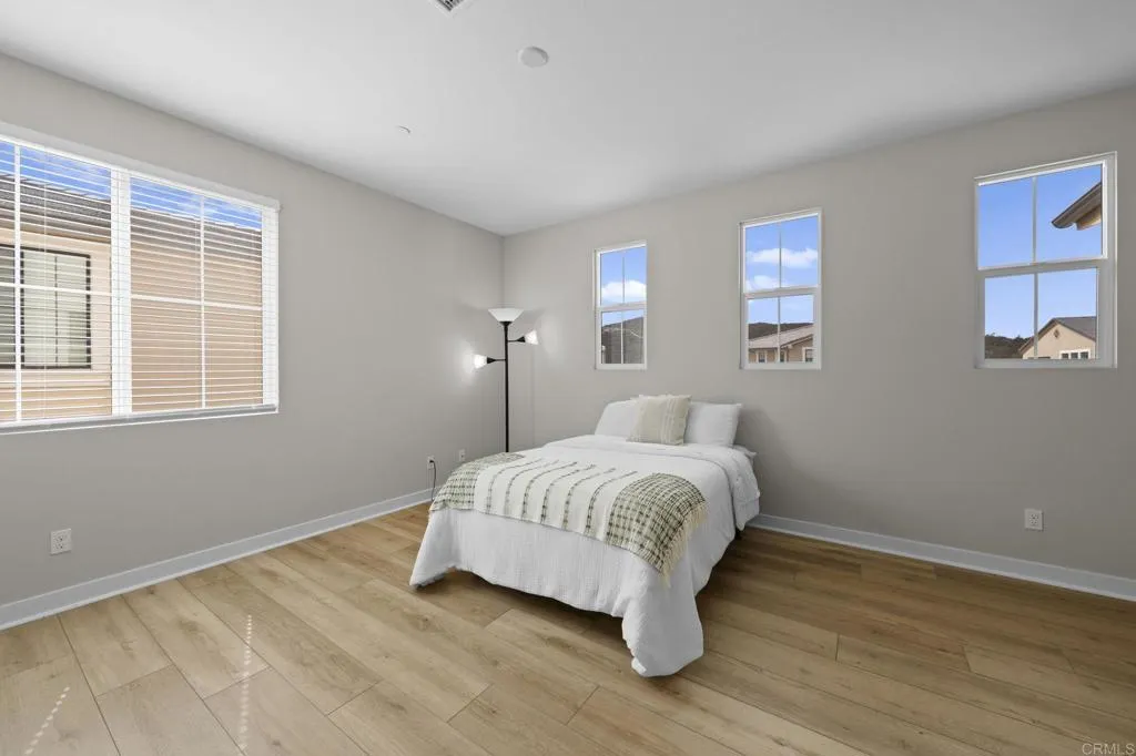 3015 Rue De Latour Vista, CA 92084 - Photo 28 of 48 a bedroom with a bed and a window