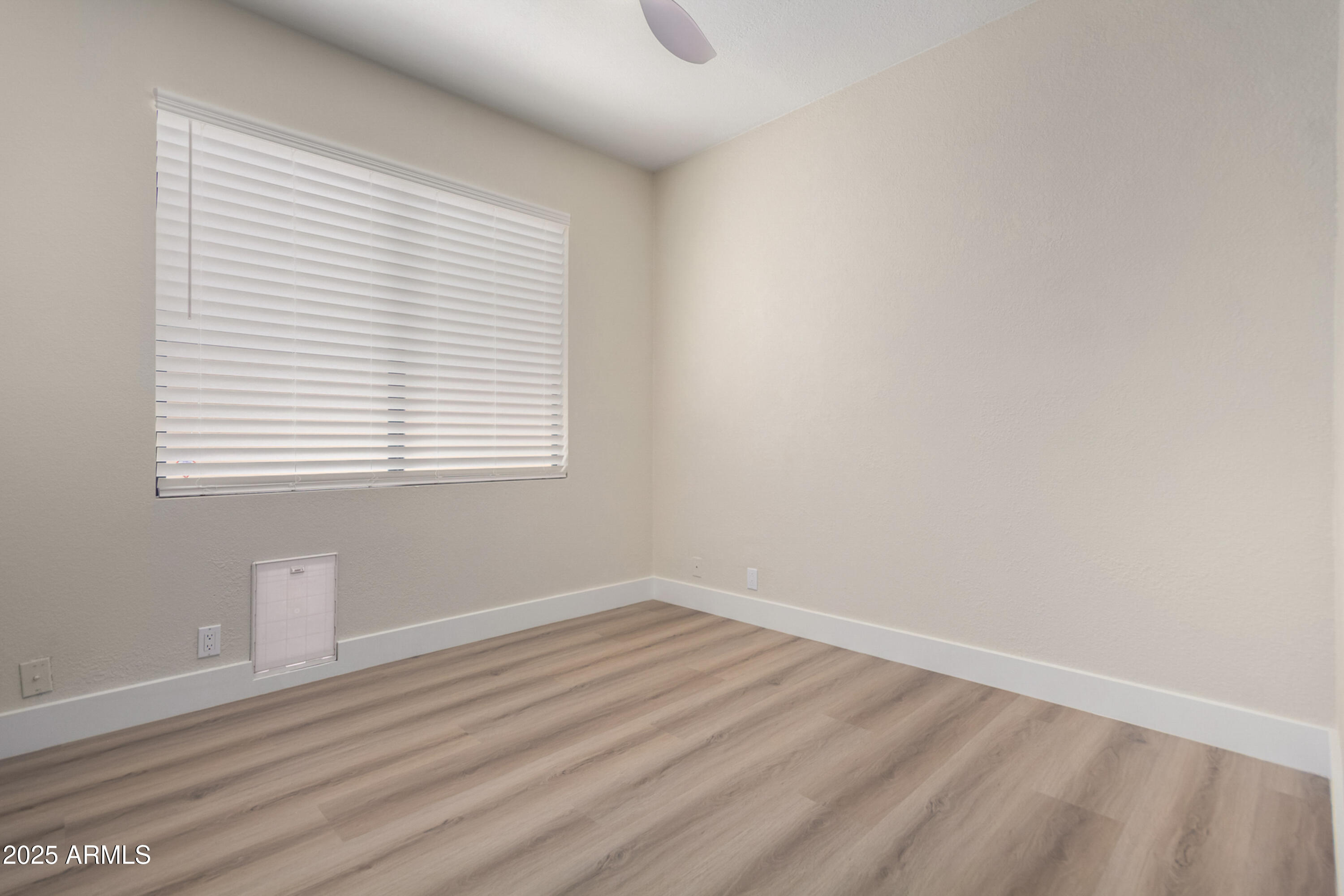1630 South Lemon Mesa, AZ 85206 - Photo 38 of 55 wooden floor in an empty room with a window