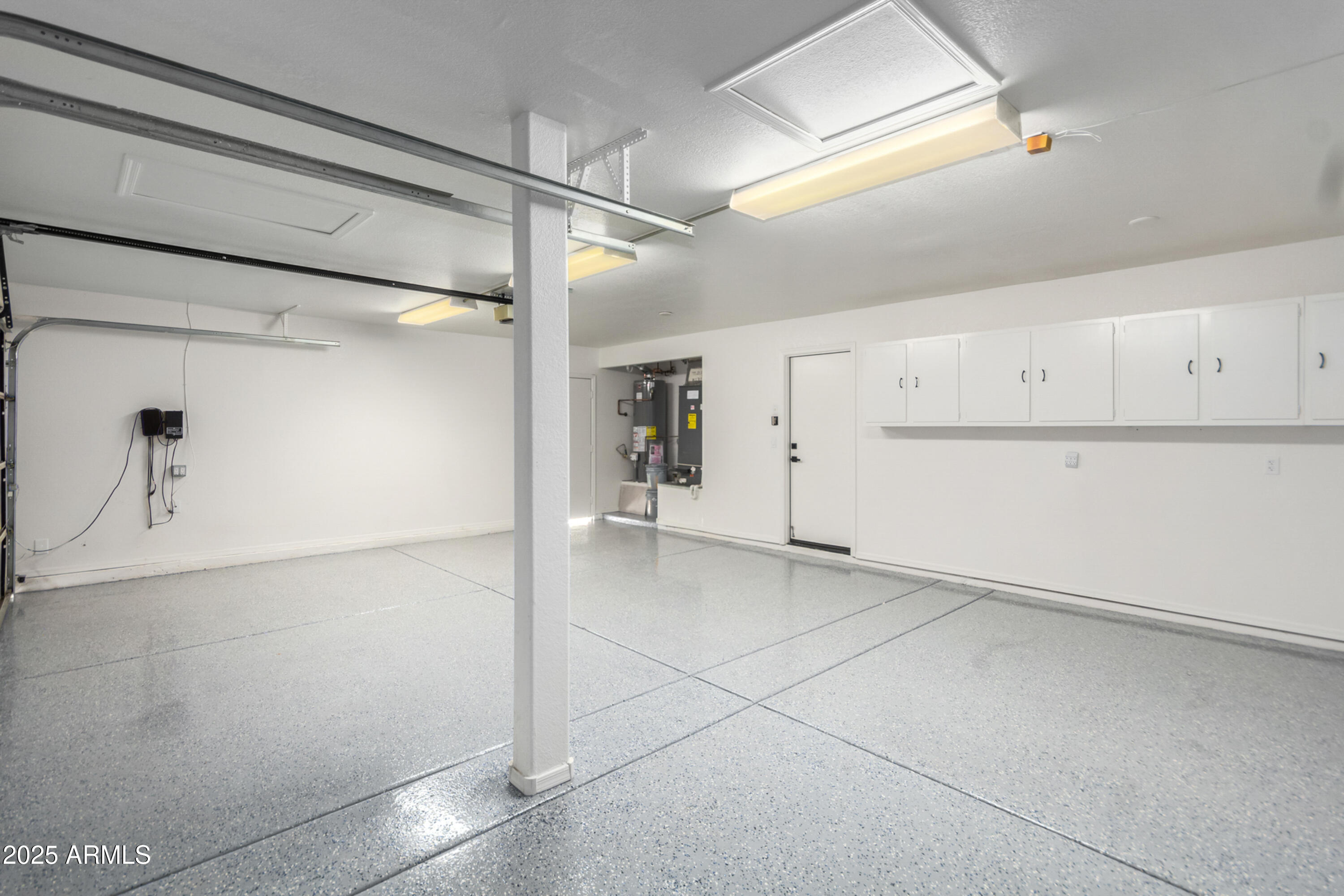 1630 South Lemon Mesa, AZ 85206 - Photo 42 of 55 a view of a refrigerator and more cabinets