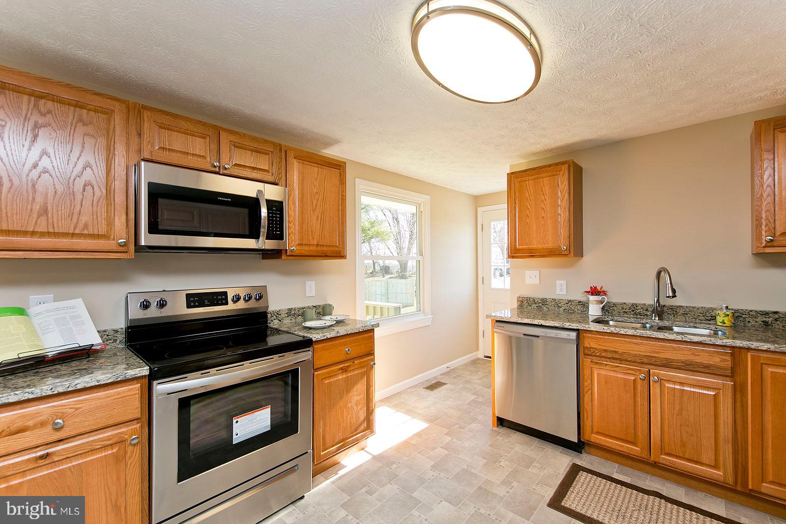 2110 Apple Pie Ridge Road Winchester, VA 22603 - Photo 12 of 48 Eat-in kitchen with stainless steel appliances