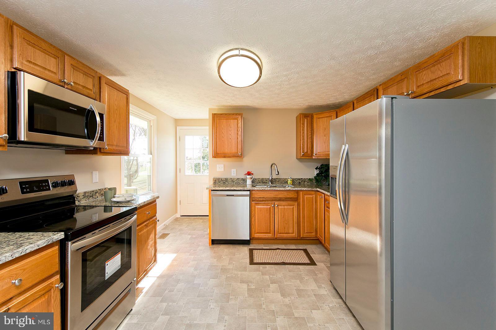 2110 Apple Pie Ridge Road Winchester, VA 22603 - Photo 4 of 48 Eat-in kitchen with stainless steel appliances
