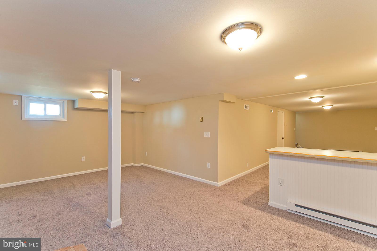 2110 Apple Pie Ridge Road Winchester, VA 22603 - Photo 32 of 48 Basement family room with bar