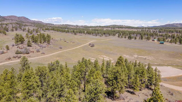 a view of a lake with sunset view