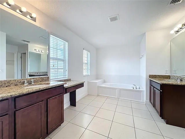 a view of a bathtub in a bathroom