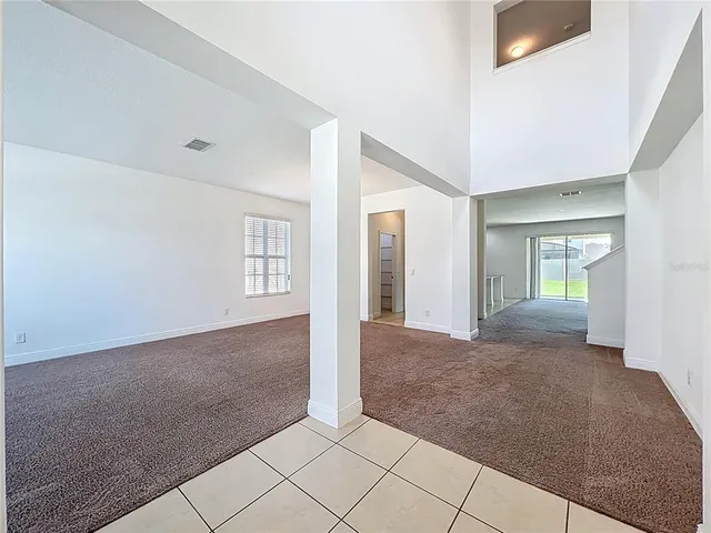 a bathroom with a granite countertop sink and vanity