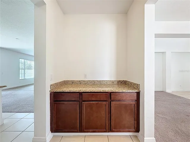 a view of a hallway with front door